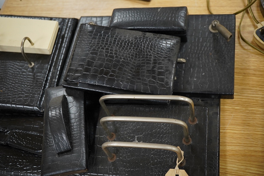A seven-piece crocodile skin-effect desk set